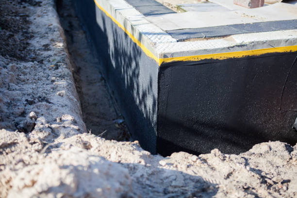 Professional Waterproofing technician working in Harrison Township, MI